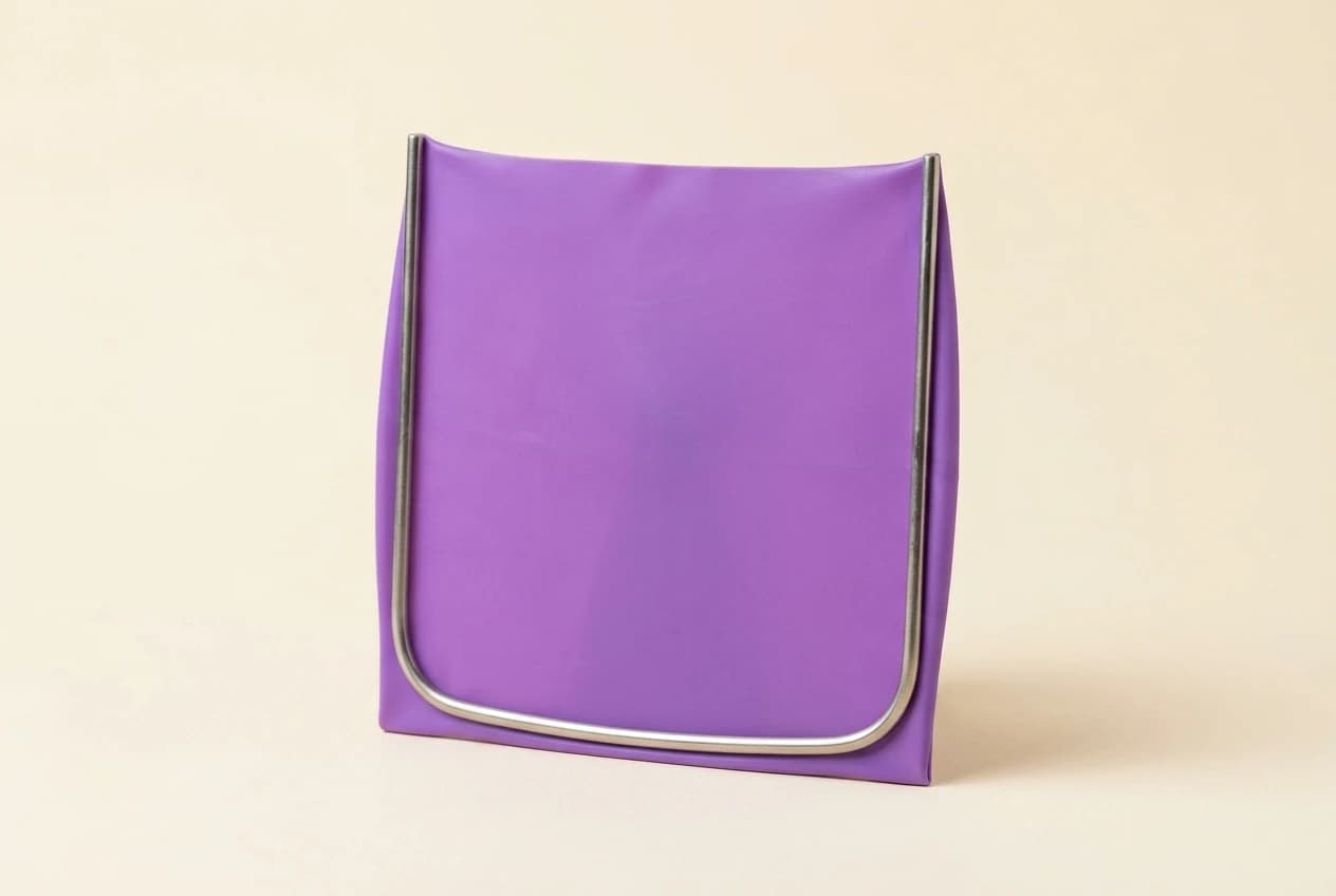 A dental dam and frame illustrated as equipment used for treatment isolation.